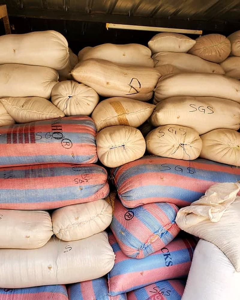 Stacked bags of commodity in a store